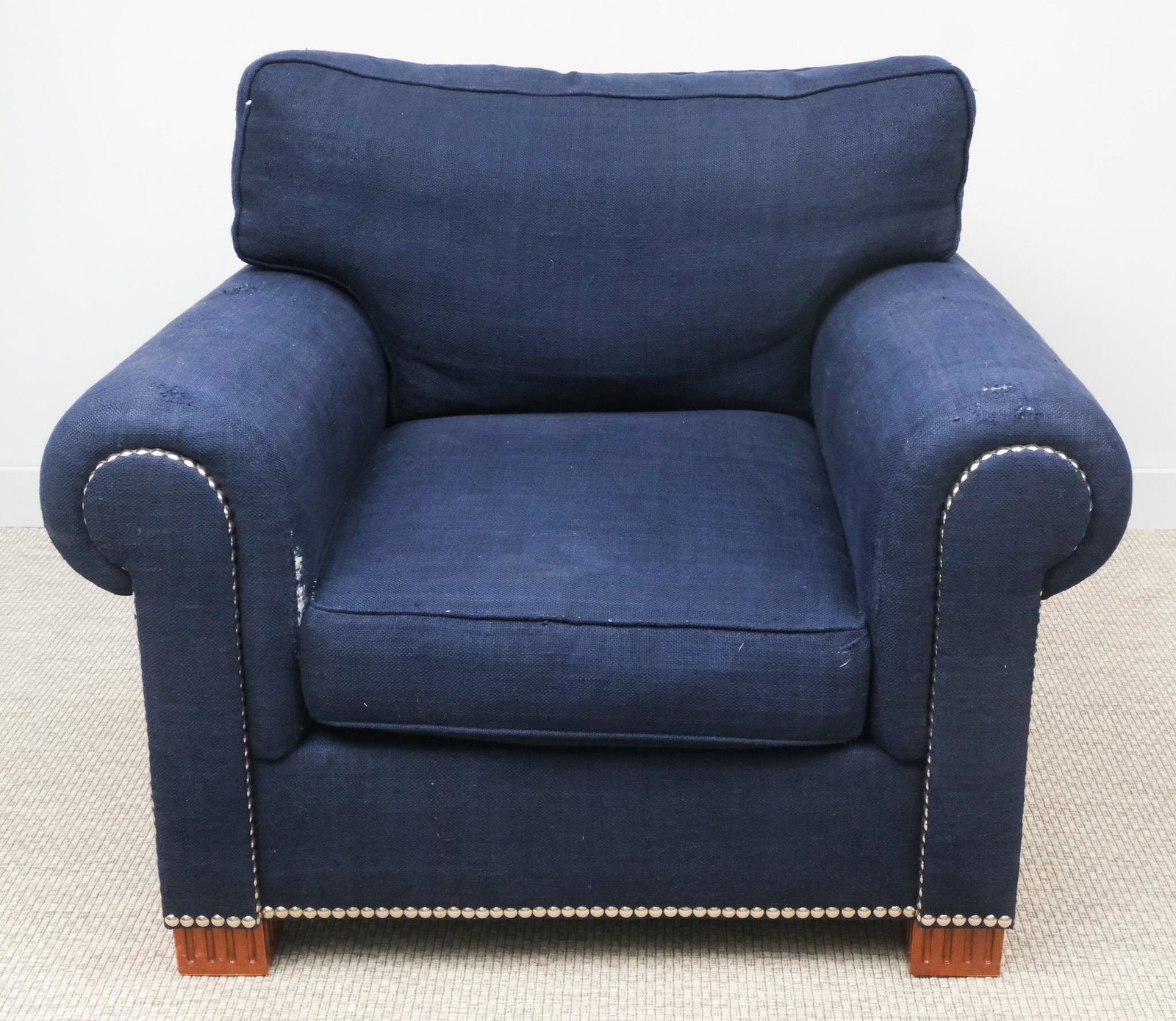 Ralph Lauren Armchair: Ralph Lauren Armchair with navy blue upholstery, chrome studs, 34" H x 42" W x 42" L.