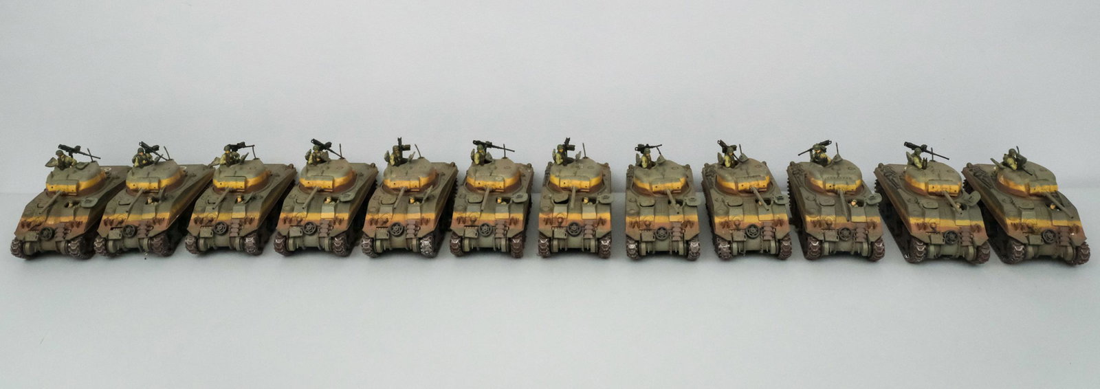 Lot of 12 21st Century Toys Army Tanks: With turning turrets and removable soldiers. 7 1/4" long.