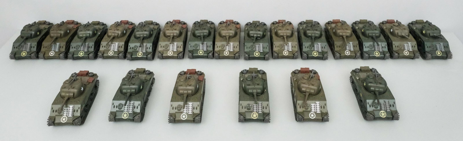 Collection of NewRay & Other Toy Tanks: Expansive grouping of toy tanks modeled after the "Classy Peg" Sherman Tank.