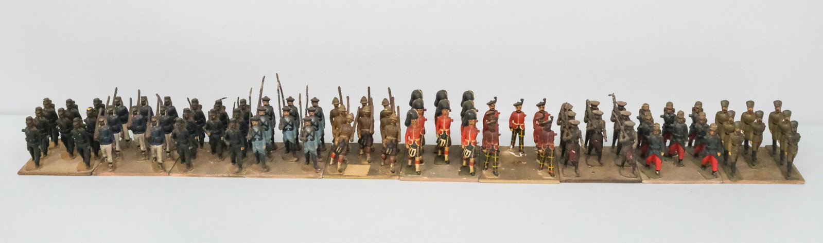 Collection of Painted Lead Soldiers: Affixed in formation, including French Foreign Legion and grenadiers.