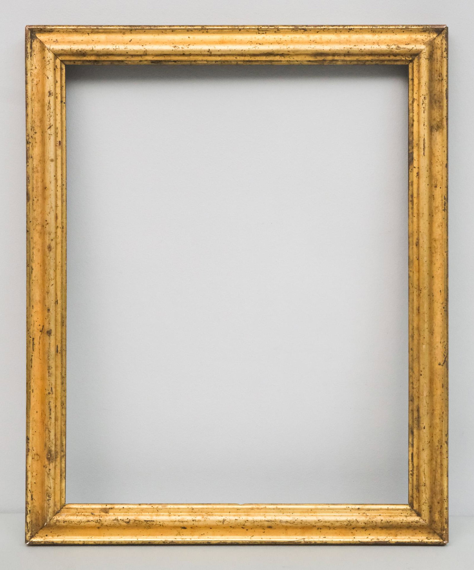 American Lemon Gold Frame: American, circa 1840, with lovely original surface. Overall 16 1/4" x 20", rabbet 13 1/2" x 17 1/2", molding 1 1/2".