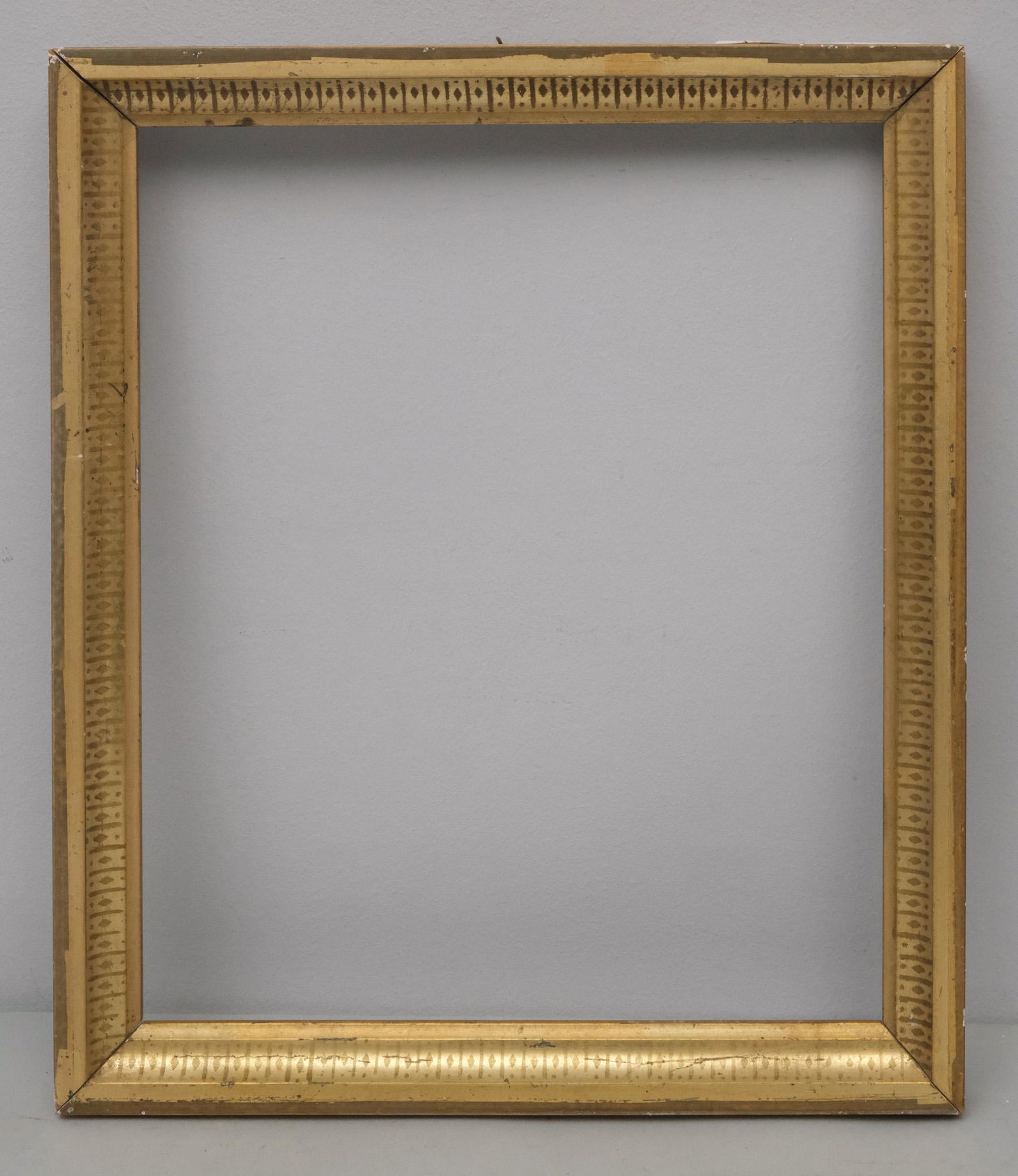 American Lemon Gold Frame: American, circa 1860, having stenciled cove, in a great standard size. Overall 11 1/2" x 13 3/4", rabbet 10" x 12", molding 1".