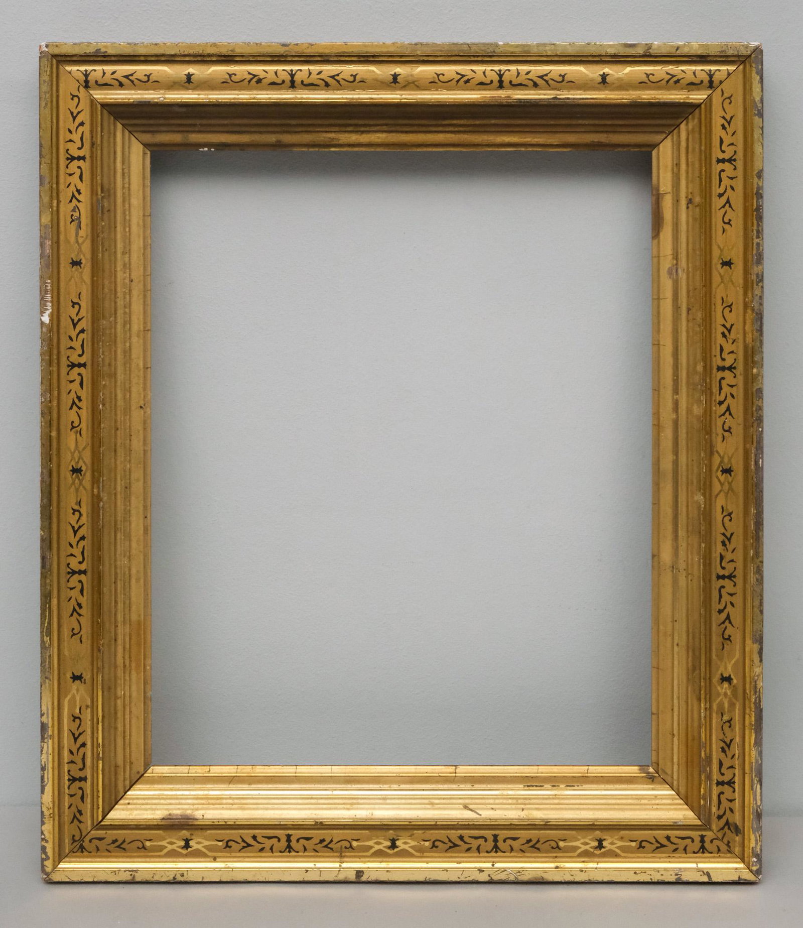American Lemon Gold Frame: American, circa 1860, having stenciled panels, in a great standard size. Overall 15 1/2" x 13 1/2", rabbet 12" x 10", molding 2".