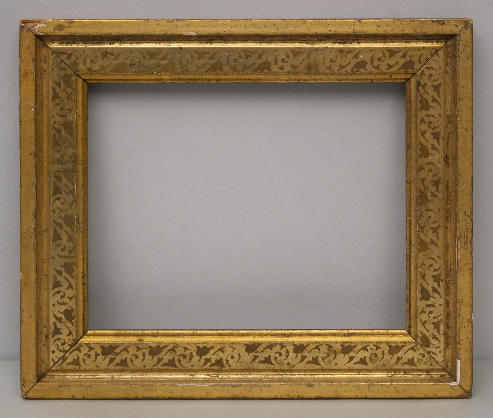 American Lemon Gold Frame: American, circa 1860, having stenciled panels, in a great standard. Overall 11 1/4" x 13 1/4", rabbet 8" x 10", molding 2".