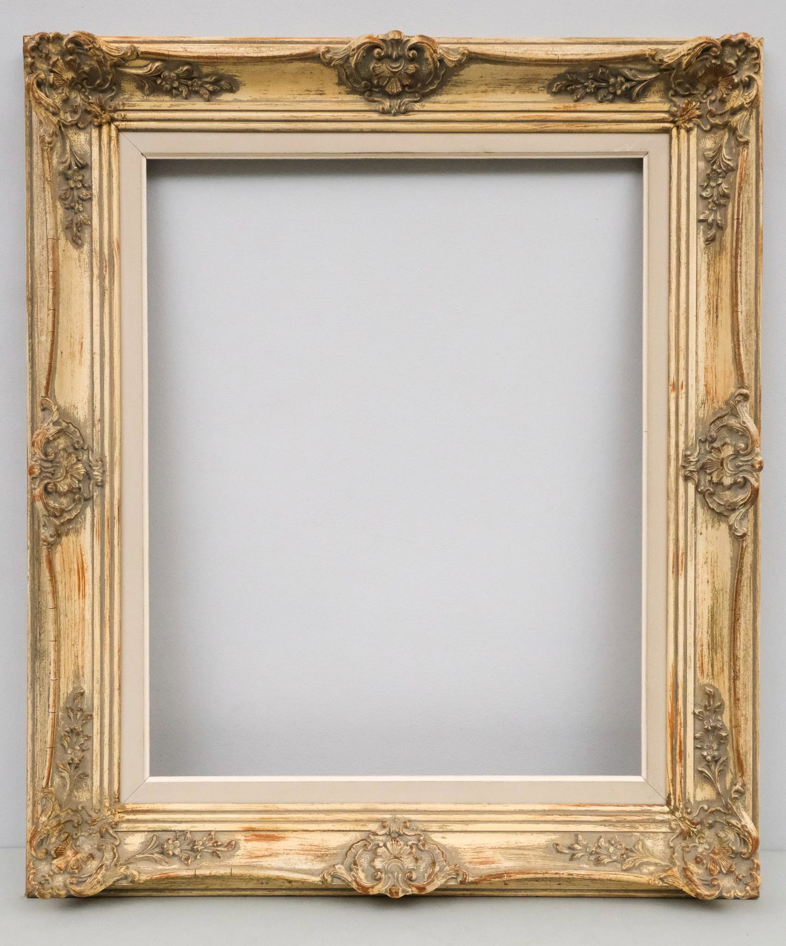 Louis XV Style Montparnasse Frame 16" x 20": French, ca. 1930, hand carved original painted and antiqued surface, in a great standard size. Overall 23" x 26 3/4", Rabbet 16" x 20", Molding 3 1/2"
