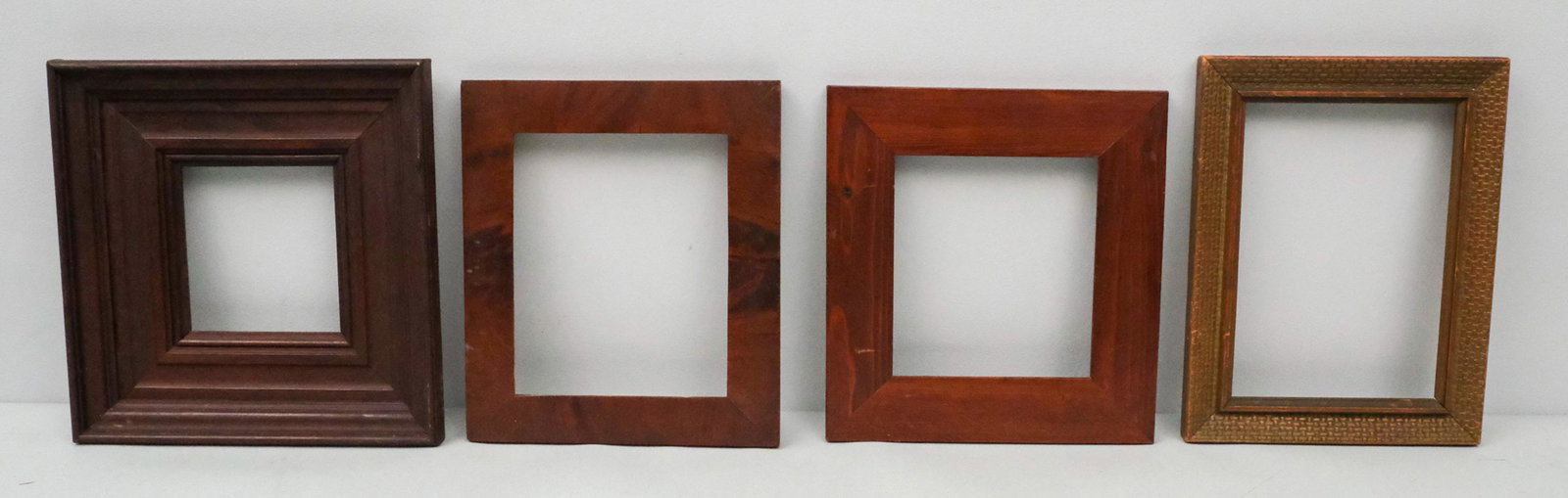 A Group of 4 American Folk Art Frames: American, 19th century. Overall 12" x 12", Rabbet 6" x 6", Molding 3 1/2" (largest)