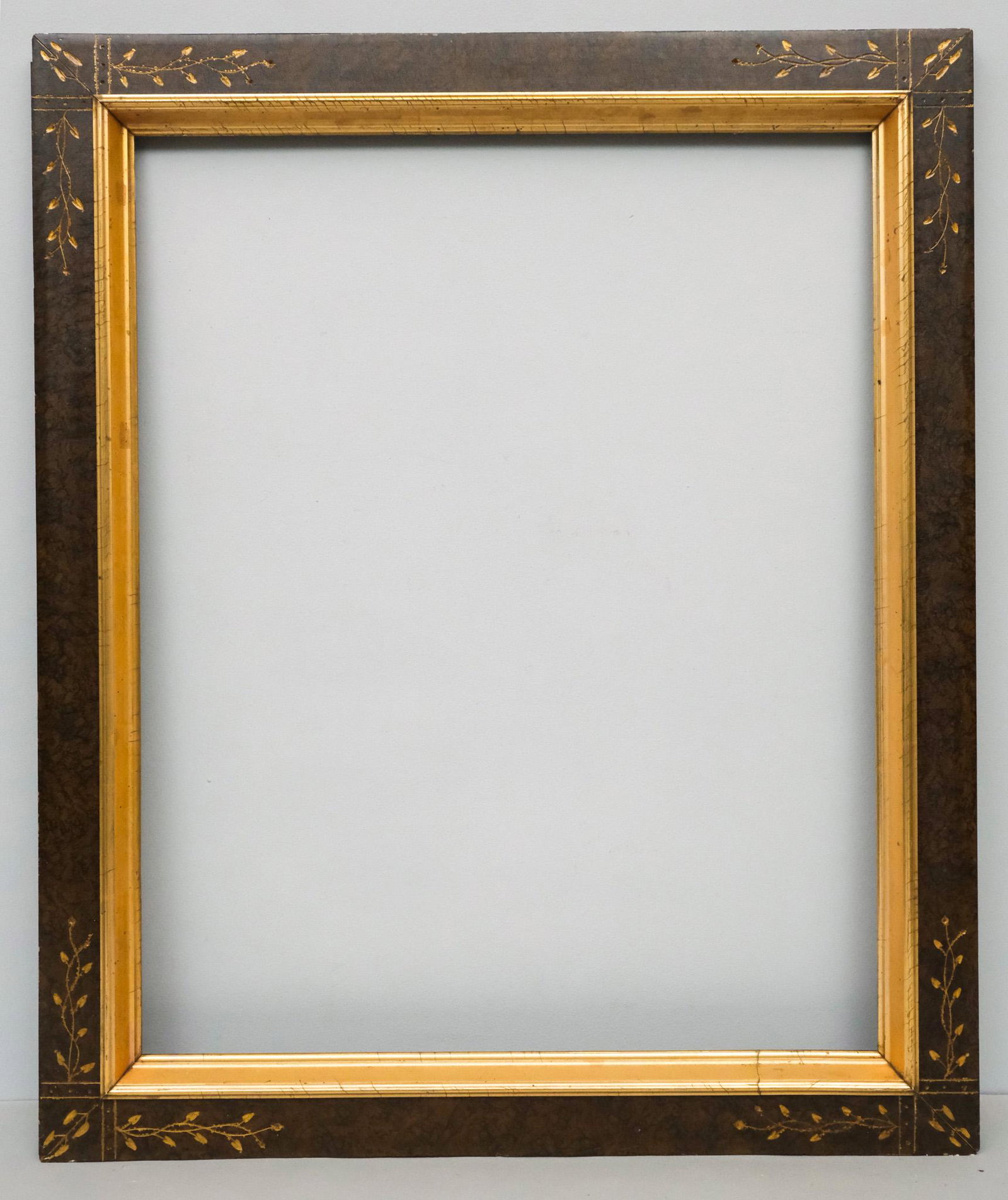 American Eastlake Gilt Frame 24" x 30": American, ca. 1880, aesthetic frame having incised gilding on burl panel, in a great standard size. Overall 29 1/2" x 35 3/4", Rabbet 24" x 30", Molding 3 1/2"