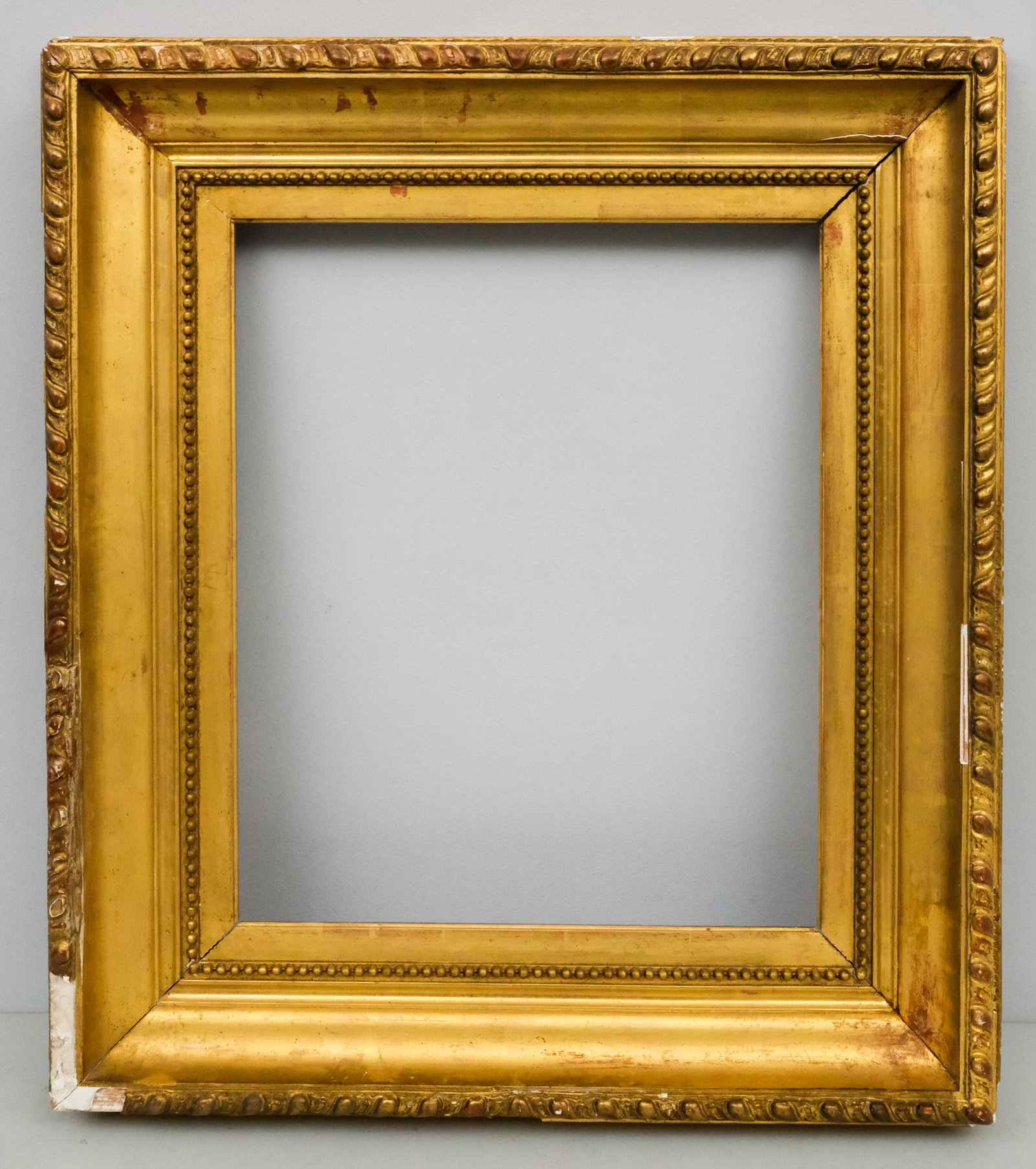 French Giltwood Frame 16" x 18": French, ca. 1850, having gadrooning at top edge and cove profile. Overall 24" x 27", Rabbet 16" x 18", Molding 5"