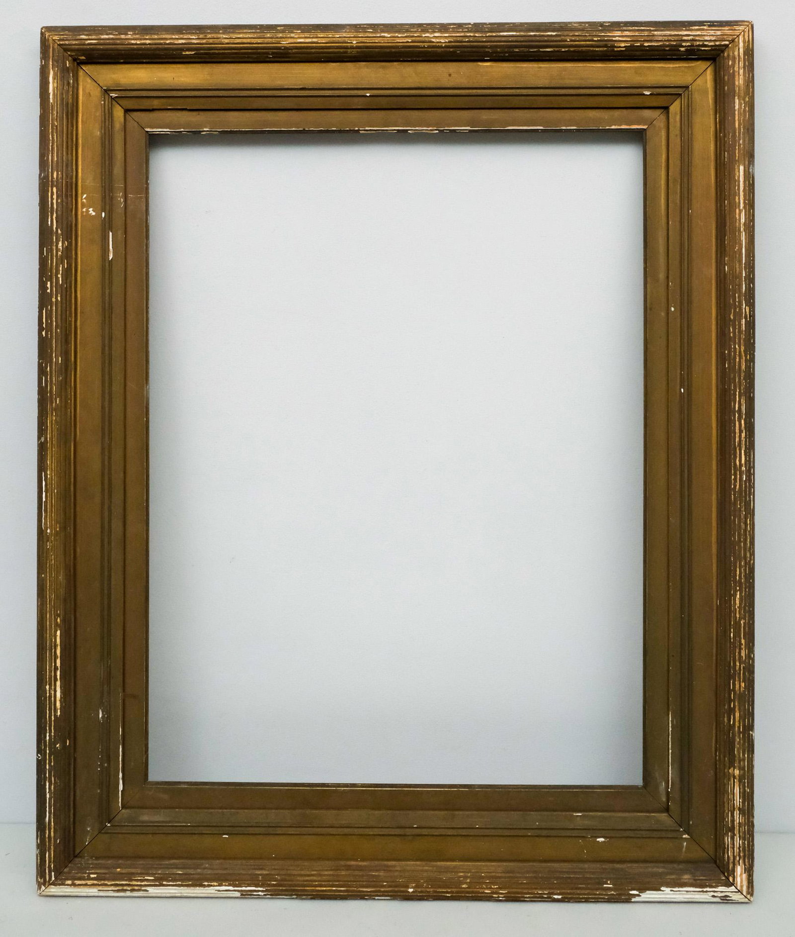 American Whistler Gilt Frame 20" x 26": American, ca. 1900, likely made by Foster Bros., having reeded profile and dark Roman gilding. Overall 28" x 33 3/4", Rabbet 20" x 26", Molding 4 1/4"