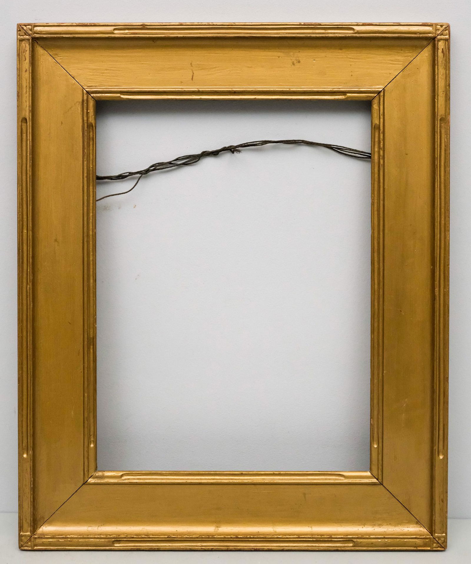 Arts & Crafts Gilt Cassetta Frame 12" x 17": American, ca. 1920, carved and gilded in the Hassam style, possibly by Newcomb Macklin. Overall 19" x 23 1/2", Rabbet 12" x 17", Molding 3 1/2"
