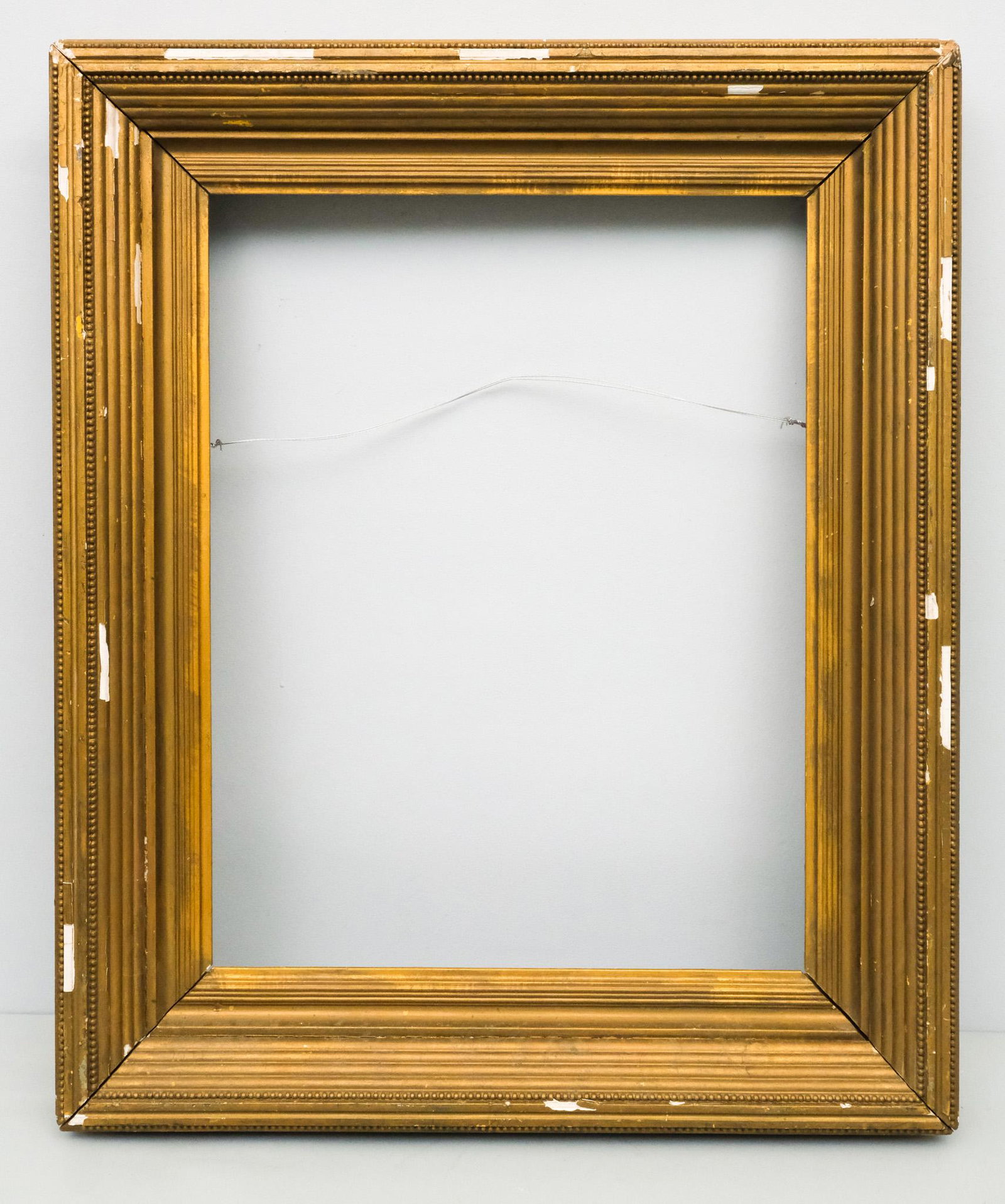 American Whistler Gilt Frame 18" x 23": American, ca. 1900, having complex reeded profile. Overall 26" x 31", Rabbet 18" x 23", Molding 4 1/2"