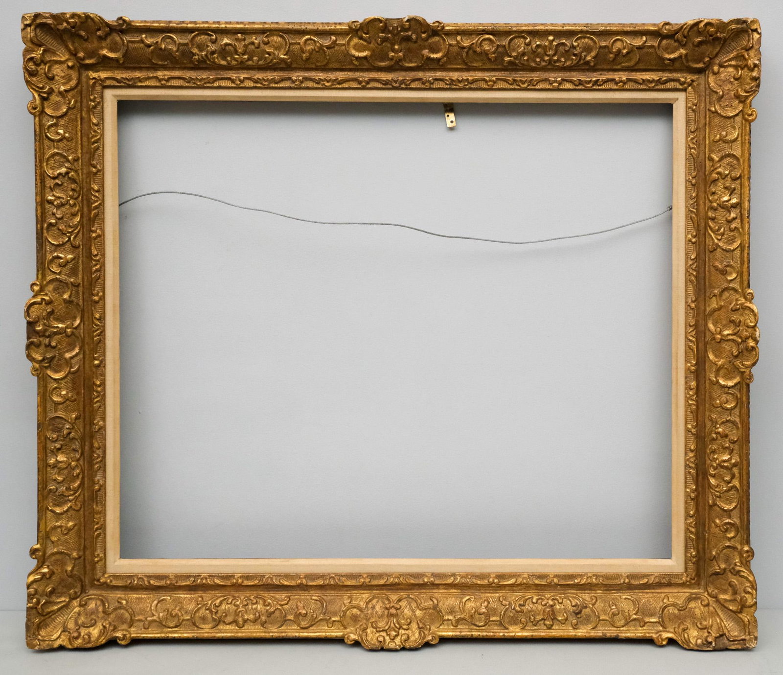 Louis XIV Giltwood Frame 25" x 30": American, 20th century, a very finely wrought custom Louis XIV style carved frame, in a great standard size. Overall 32 1/2" x 37 1/2", Rabbet 25" x 30", Molding 4"