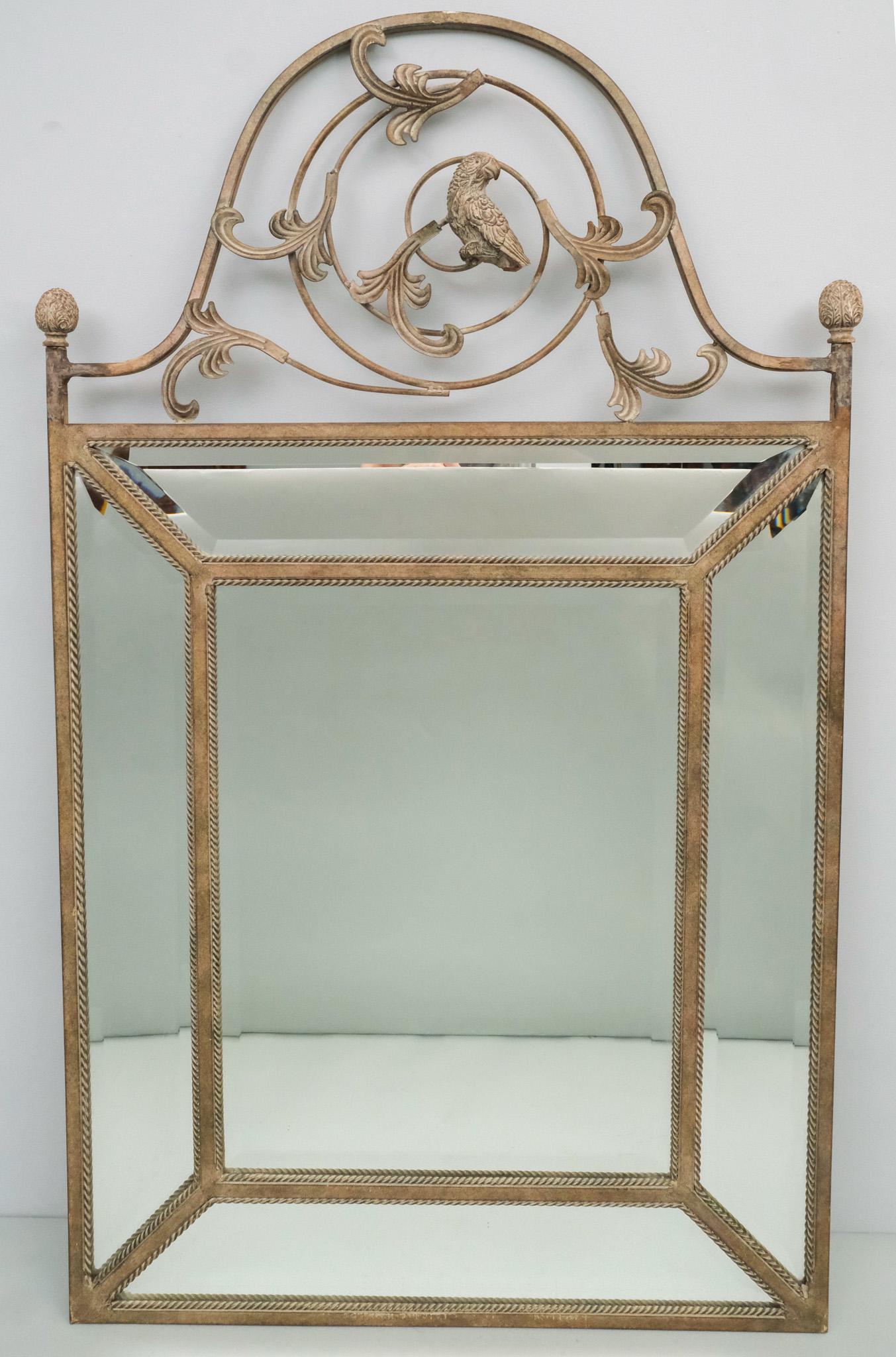 Wrought Metal Mirror: Mid-century wrought metal mirror with bird decoration at top, 51 1/2" x 30 1/2" overall.