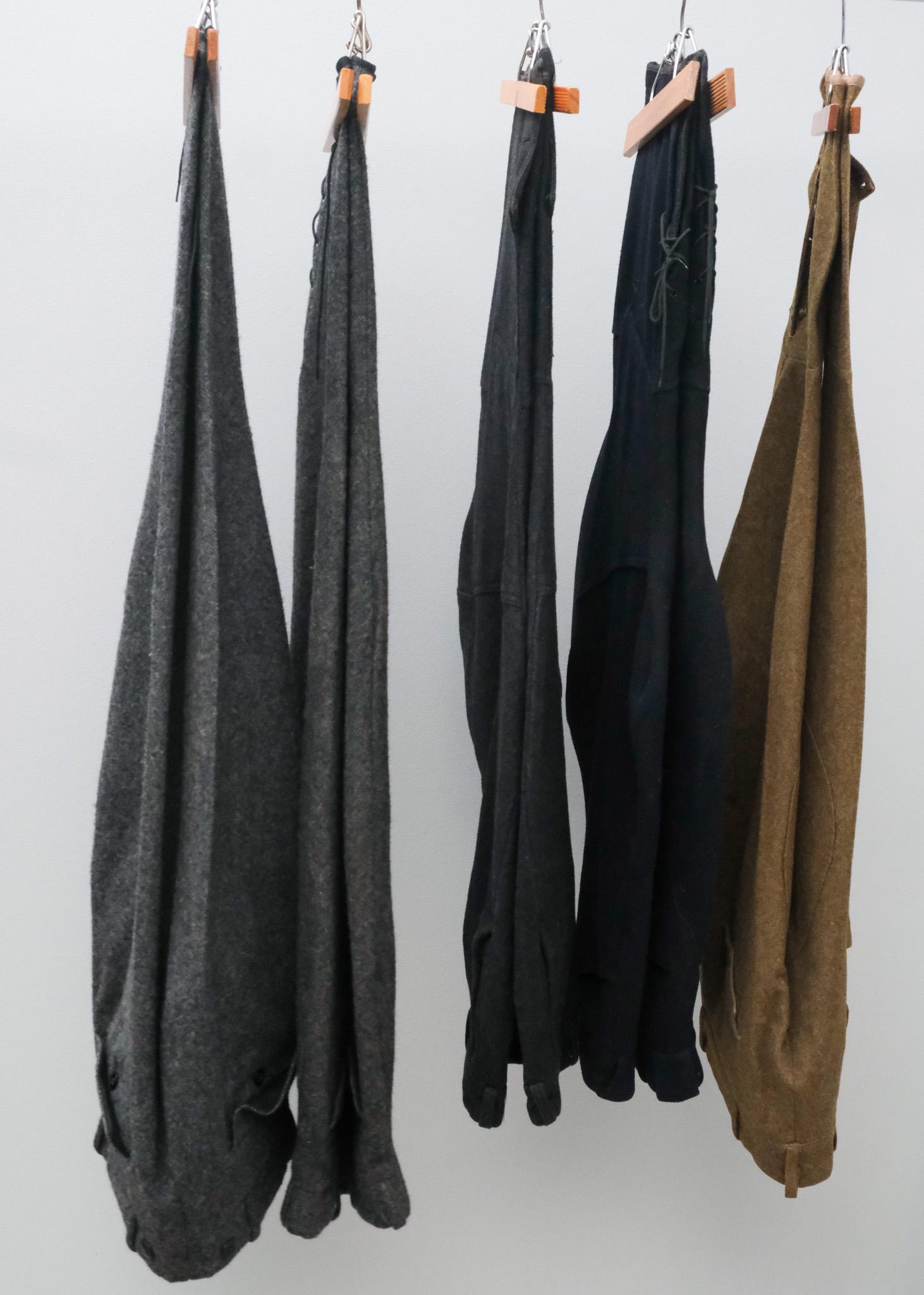 5 Vintage Wool Jodhpurs or Riding Breeches: 1) Black wool Dubbleware laced leg 30" waist, 35" length. 2) Dark gray wool with boat sail cloth pocketing and button legs 30" waist, 35" length. 3) and 4) Gray herringbone tweed Woolrich for R.H Macy