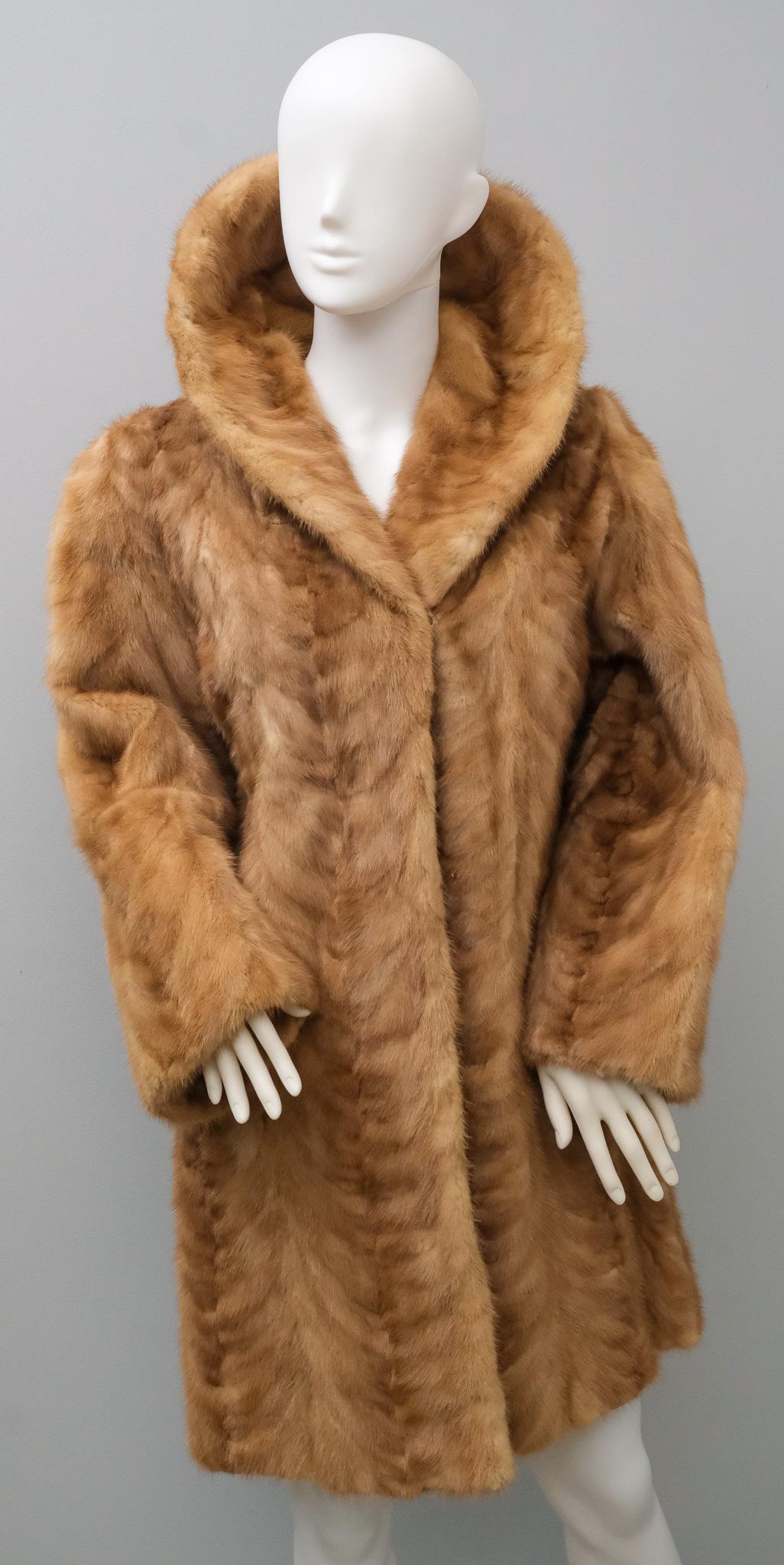 2 Mink Capelets and a Mink Coat: Darker brown mink capelet labeled "Cherry & Webb", honey colored one labeled "Rowat Cusson Ross Furs", coat is labeled "The Outlet Company of Providence RI", all with silk lining.