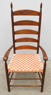 Shaker Style Side Chair: American, early 20th century Shaker tilter style chair with woven seat, ladder back, finial posts, 51" H x 23 1/2" W x 20" L.