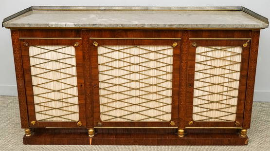 Regency Rosewood Marble Top Bookcase: 19th century regency rosewood veneer bookcase or cabinet with brass inlay, three brass-grilled cabinet doors with pleated silk lining,gray marble top with brass gallery, 35 1/2" H x 68" W x 16" L.
