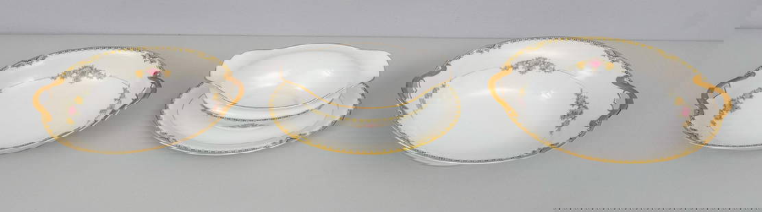 Extensive Noritake Porcelain Set "Sevry" Pattern: Comprising: (8) luncheon plates, (19) sauce bowls (one broken), (18) bread & butter plates (one with small chip), (8) salad plates, (18) coupe soup bowls, (18) cups with (20) saucers (one cup cracked)