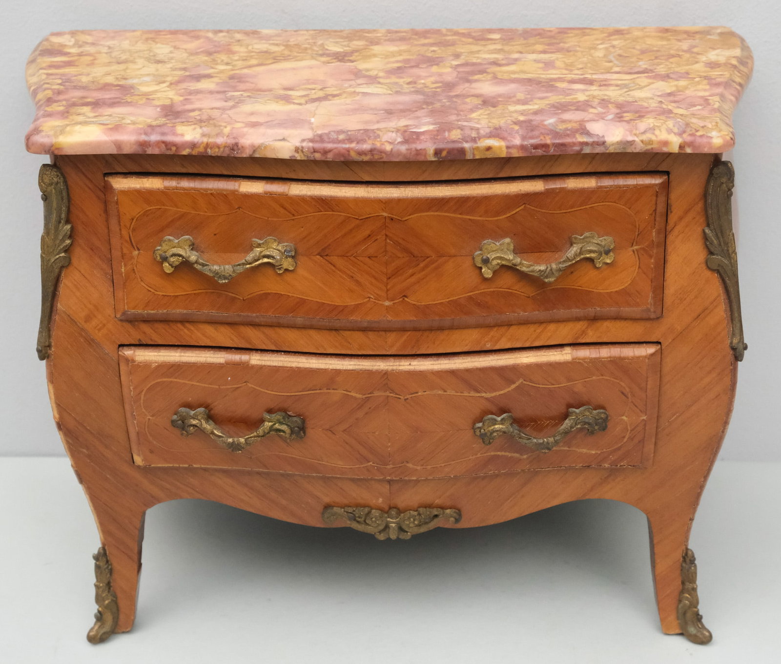 French Parquetry Jewelry Chest with Rouge Marble: Possibly a doll toy chest or salesman's sample. Gilt metal mounts and drawer pulls. 6" x 9 3/4" x 13".