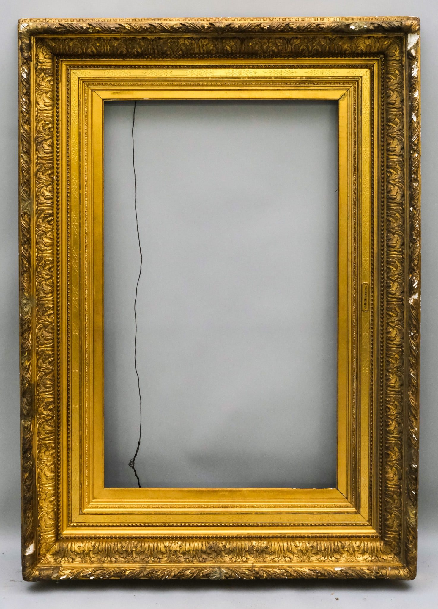 American Hudson River School Gilt Frame 24" x 40": American, ca. 1870, having acanthus decorated ogee and incised liner, bears name plate for J.B. Bristol. Overall 40 3/4" x 56 3/4", Rabbet 24" x 40", Molding 8 1/2".