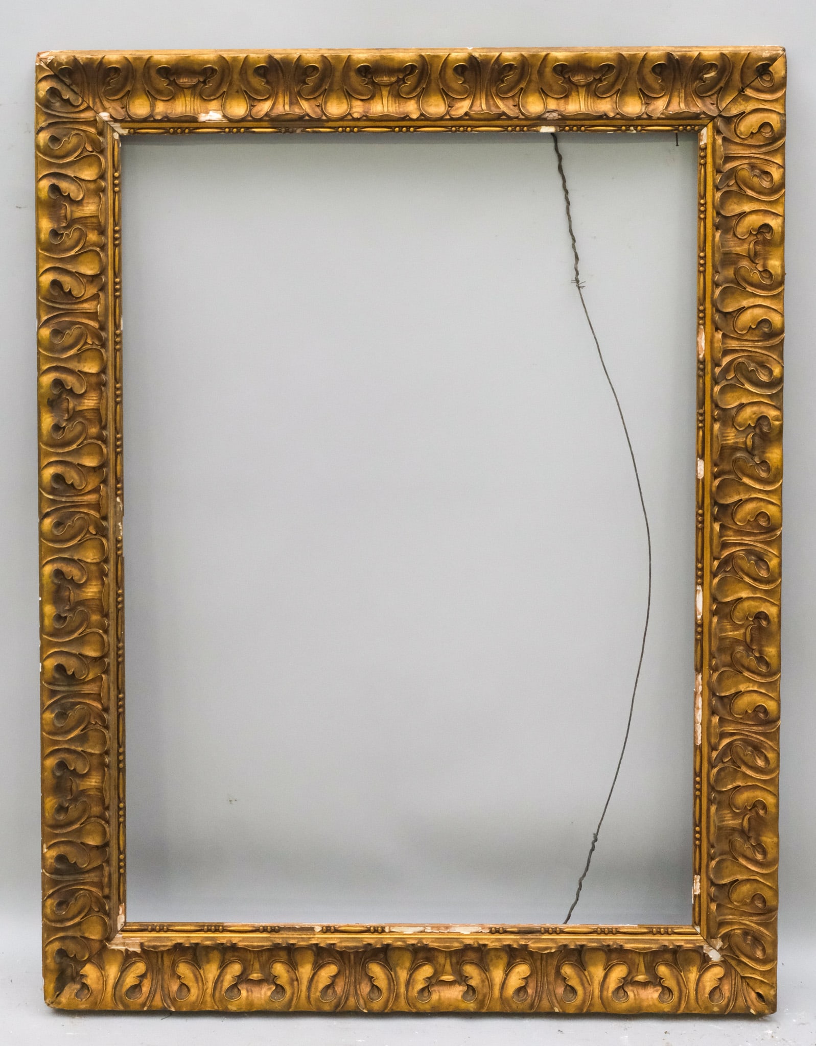 American Arts & Crafts Frame 27" x 38": American, ca. 1920, having acanthus decoration, possibly by Newcomb Macklin. Overall 34 3/4"x 45 3/4", Rabbet 27" x 38", Molding 4".