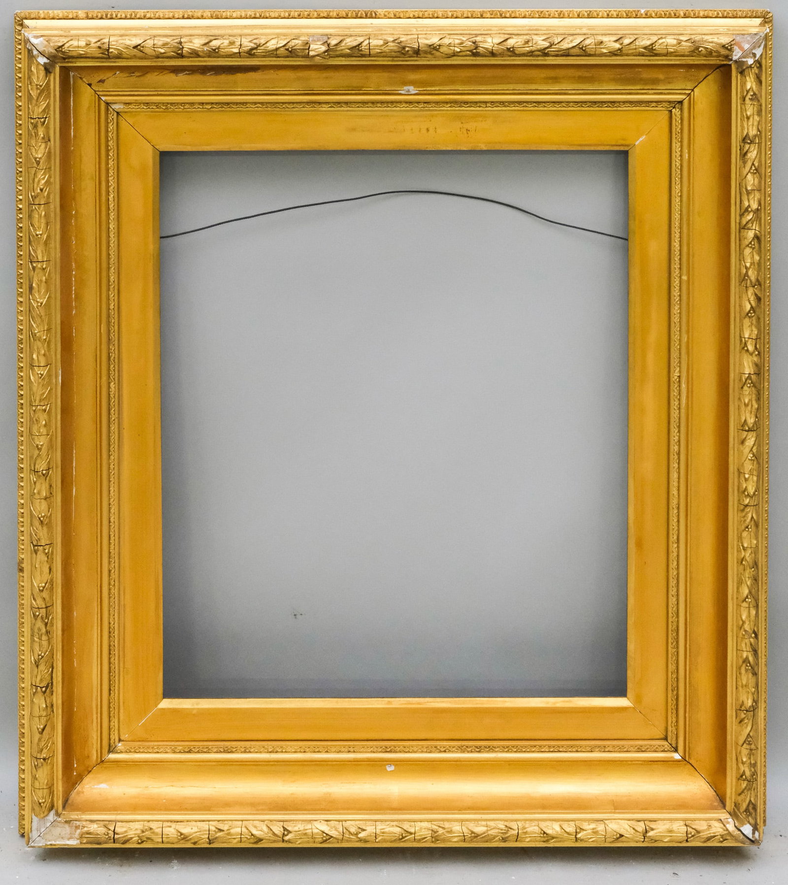 Hudson River School Gilt Frame 20" x 24": American, ca. 1880, having cove profile and laurel and berry top edge, in a great standard size. Overall 31 1/2" x 35 1/2", Rabbet 20" x 24", Molding 5 3/4".