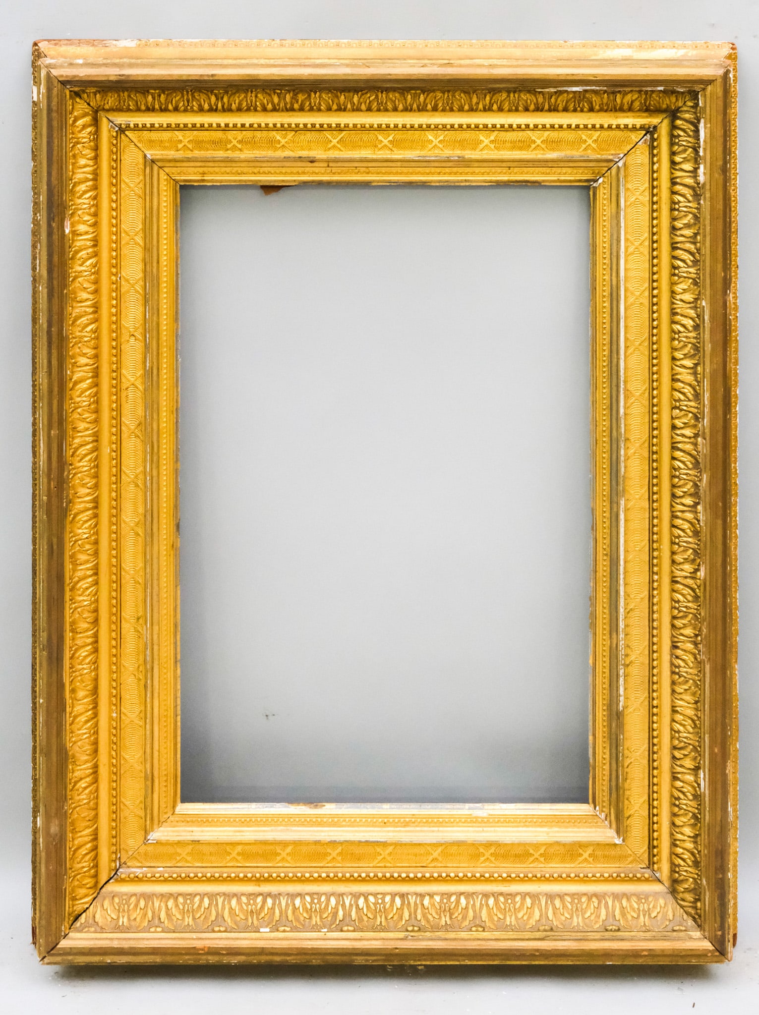 American Barbizon Gilt Frame 16" x 24 3/4": American, ca. 1870, having acanthus ogee and pattern liner decoration. Overall 27 1/4" x 36", Rabbet 16" x 24 3/4", Molding 5 3/4".