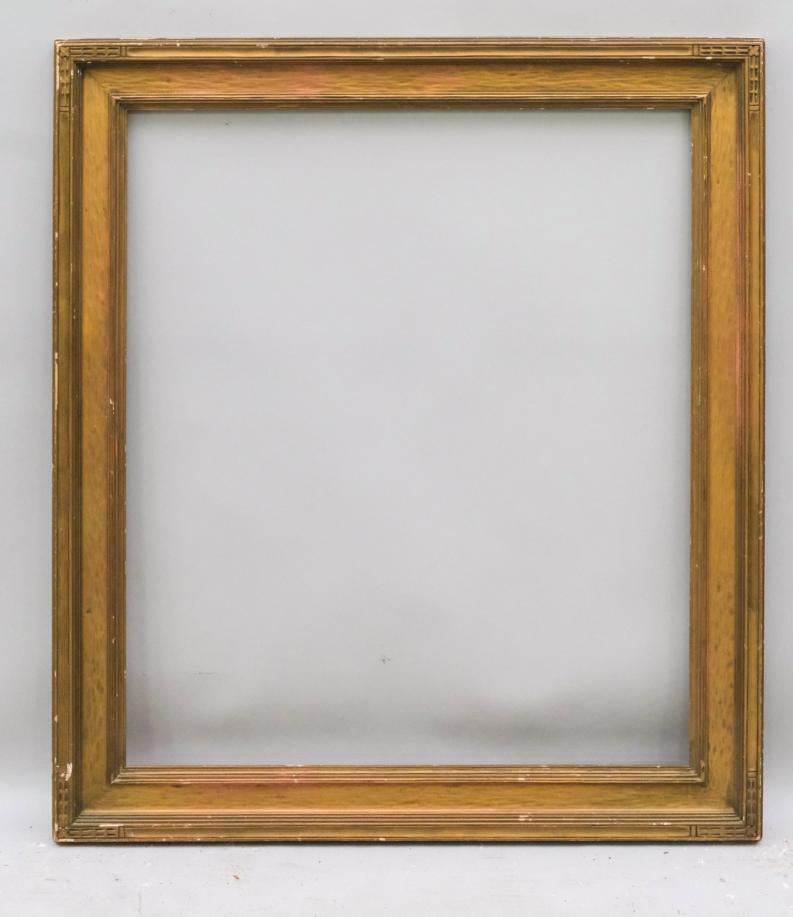 American Arts & Crafts Gilt Frame 28" x 33": American, ca. 1910, having cassetta form and Roman gilding. Overall 34 1/2" x 39 3/4", Rabbet 28" x 33", Molding 3 1/2".