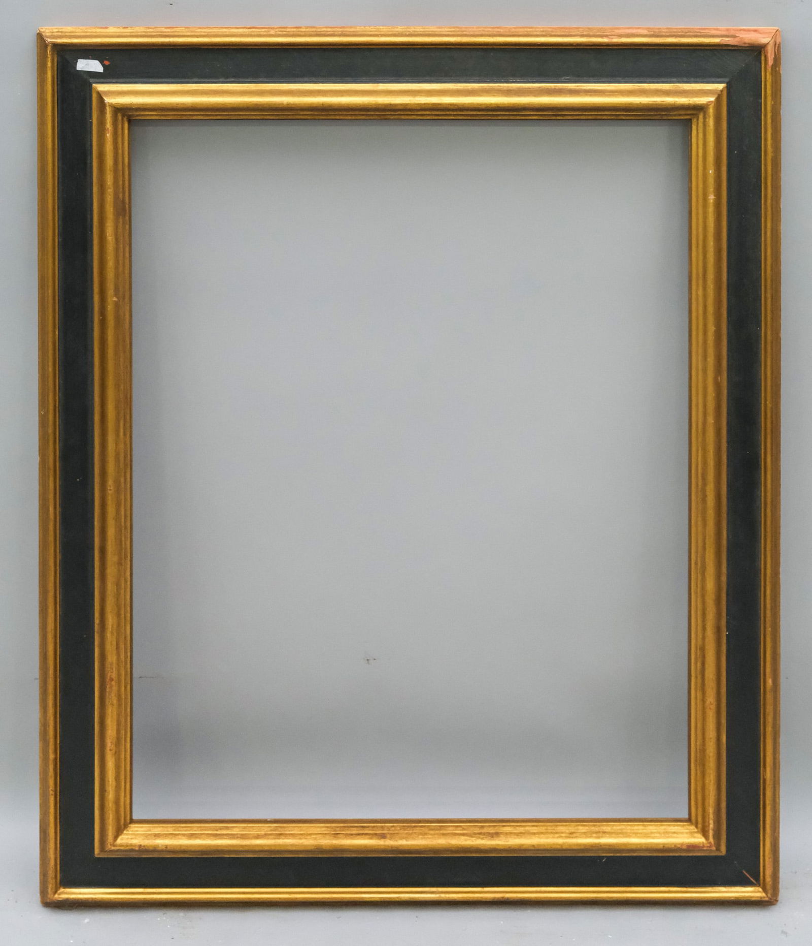 Newcomb Macklin Gilt Frame 22" x 28": Newcomb Macklin, ca. 1930, having reverse profile, maker's label verso. Overall 28 1/2" x 34 3/4", Rabbet 22" x 28", Molding 3 3/4".