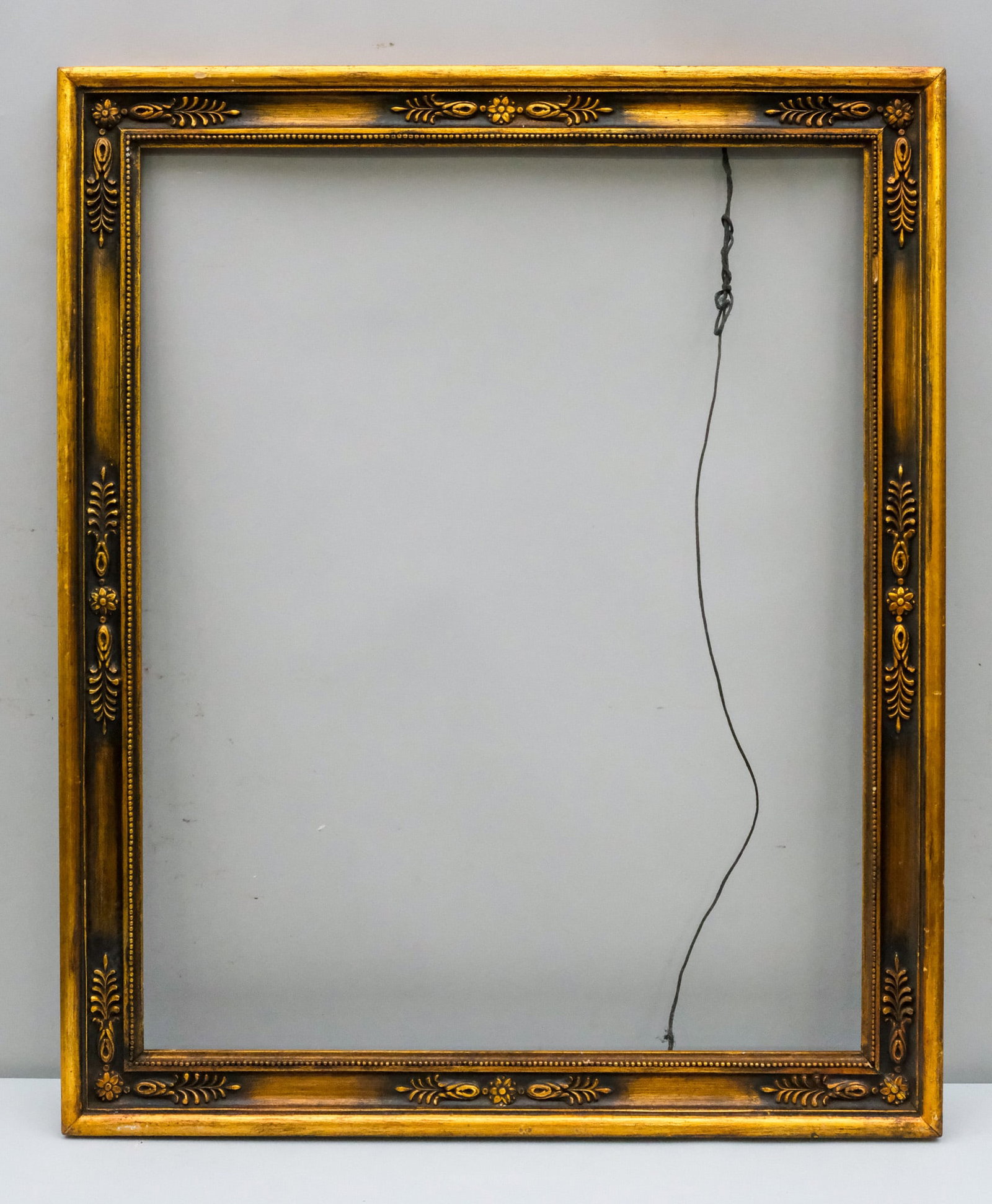 American Arts & Crafts Gilt Frame 24" x 30": American, ca. 1930, having neoclassical motifs. Overall 28 1/4" x 34 1/4", Rabbet 24" x 30", Molding 2 1/2".