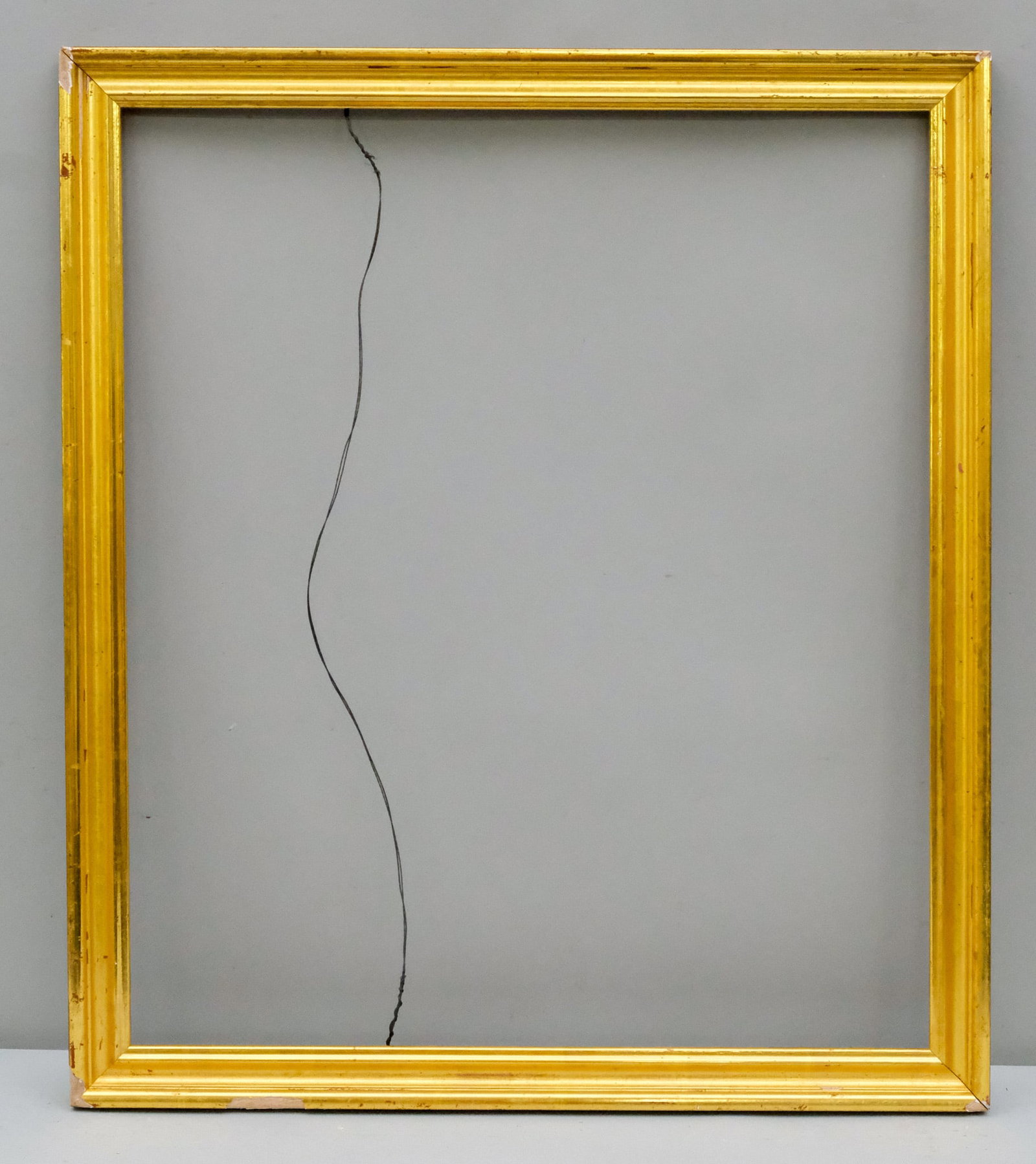 Custom Giltwood Frame 20 1/2" x 24": American, 20th century, having brightly gilded cove profile. Overall 23 1/4" x 26 3/4", Rabbet 20 1/2" x 24", Molding 1 1/2".