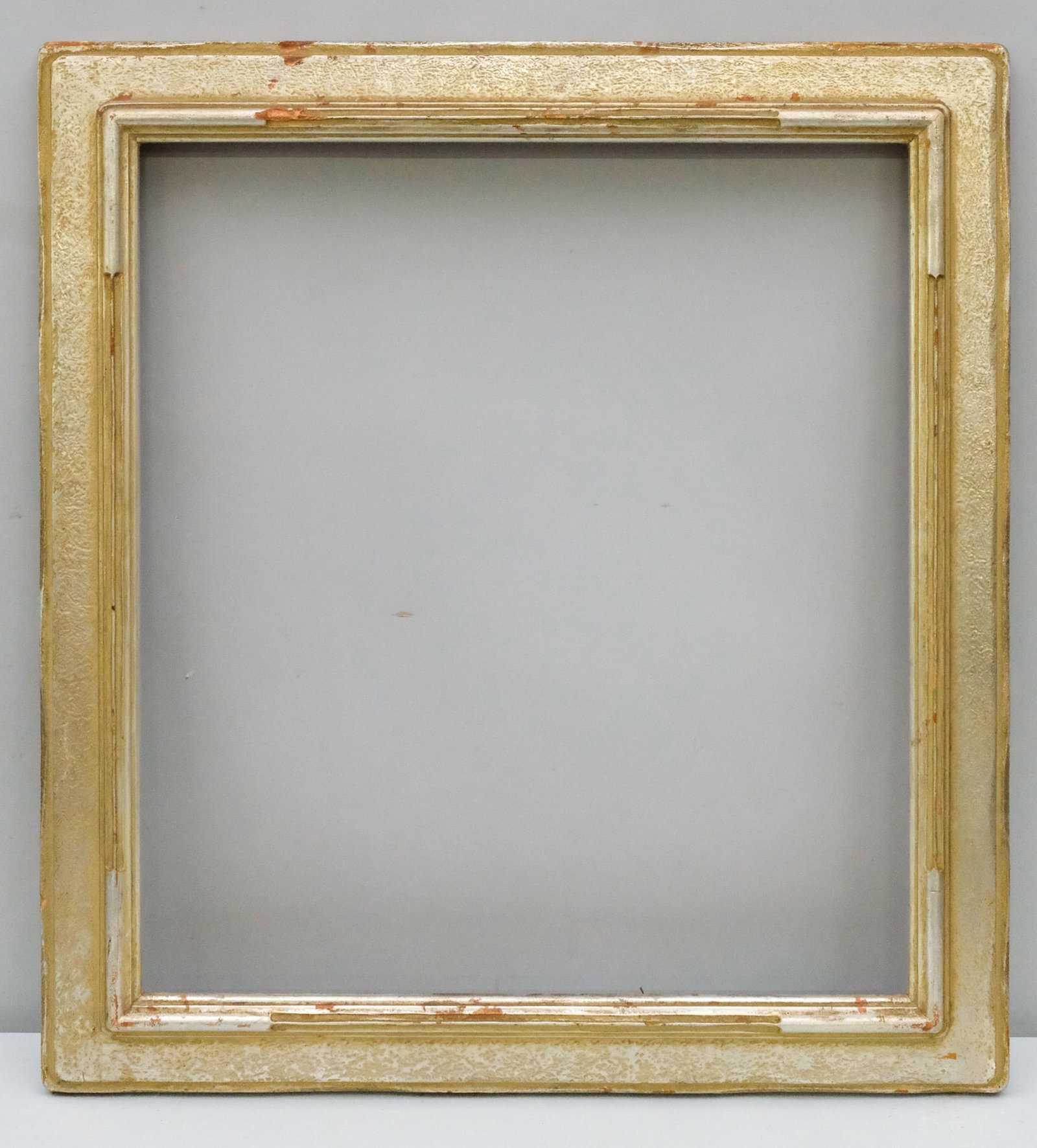 American Arts & Crafts Frame 18" x 20": American, ca. 1920, having silvery gold surface. Overall 22 1/4" x 24 1/4", Rabbet 18" x 20", Molding 2 1/2".