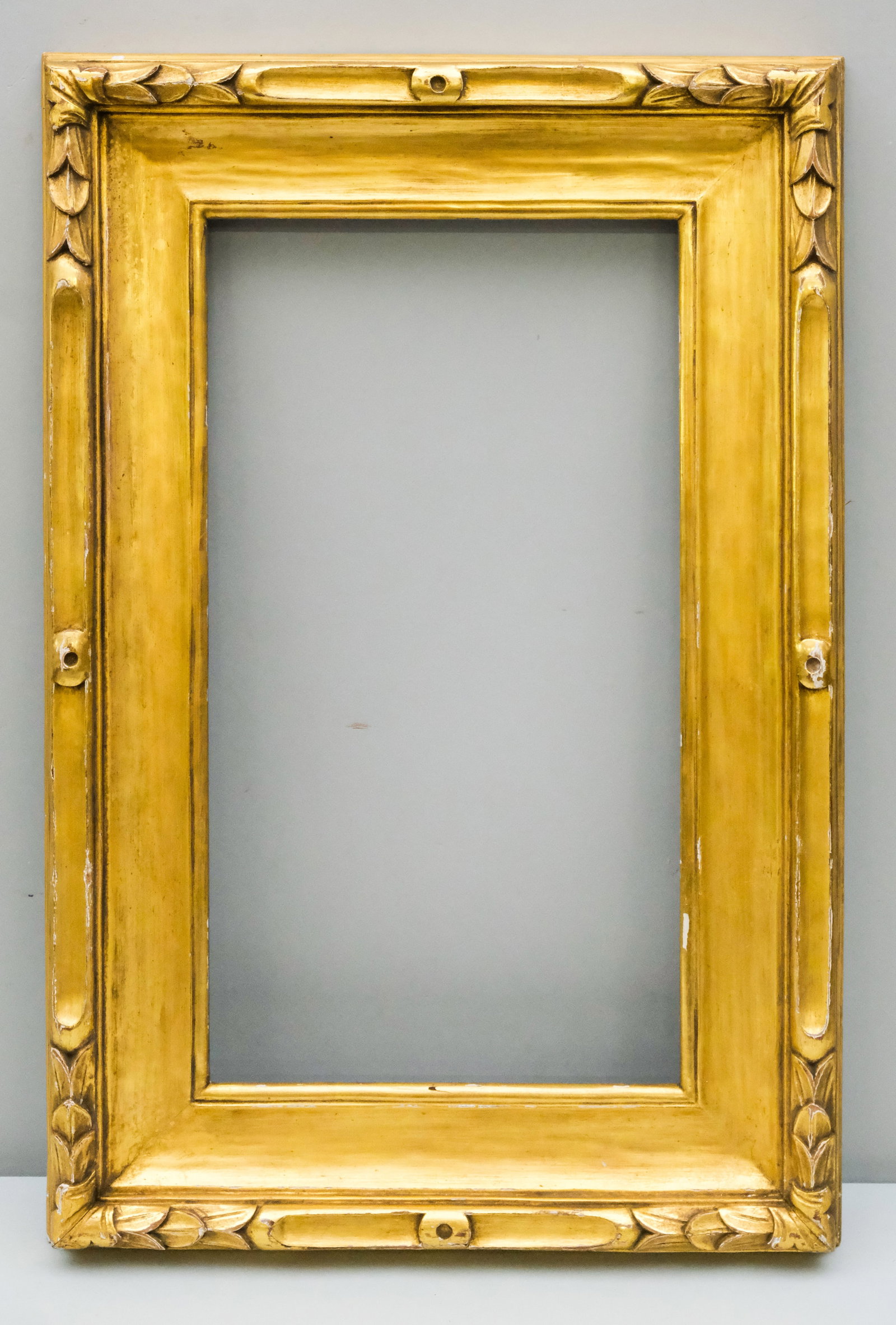 American Arts & Crafts Gilt Frame 10 3/4" x 19": American, ca. 1910, carved and gilded, likely by J.H. Miller. Overall 17" x 25 3/4", Rabbet 10 3/4" x 19", Molding 3".
