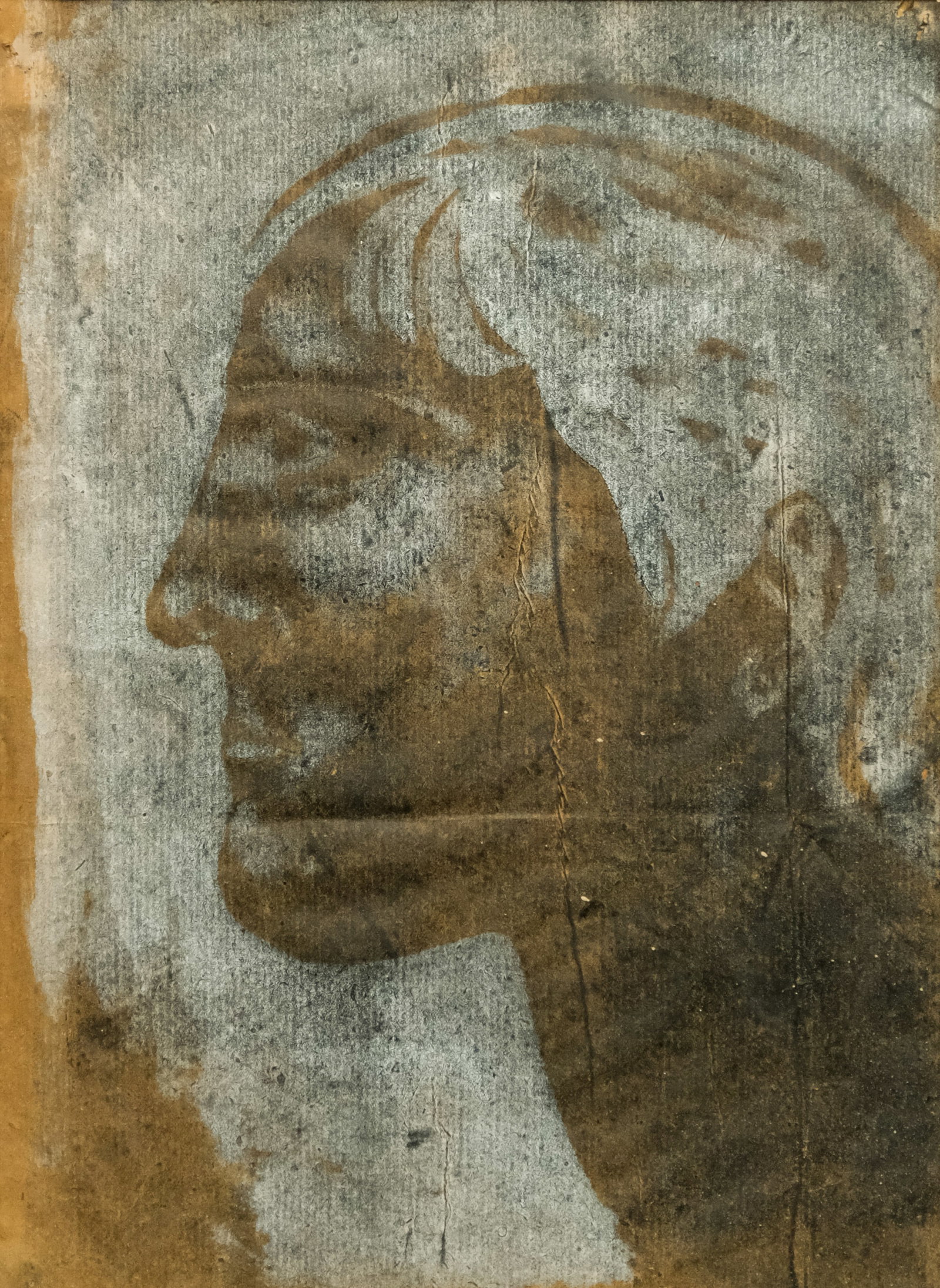 Michael Tulysewski, "Profile in Brown": Michael Tulysewski (American, 20th century), 1952, mixed media on brown paper depicting a man's face in profile, signed verso, 15" x 10 3/4" sight size, 19 3/4" x 16 3/4" framed.
