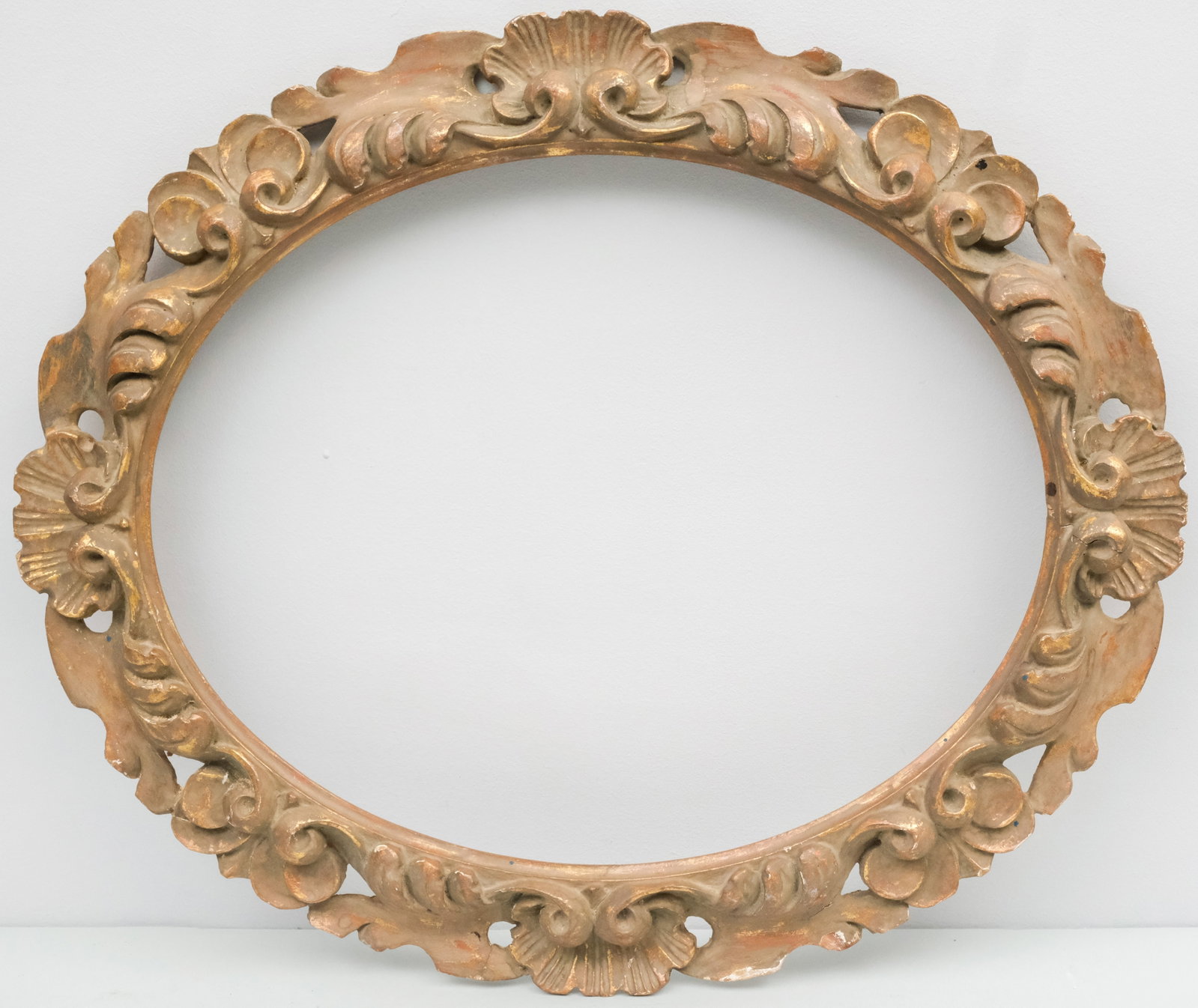 Italian Giltwood Oval Frame 15 1/2" x 19 1/2": Italian, ca. 1900, hand carved and gilded. Overall 21" x 25", Rabbet 15 1/2" x 19 1/2", Molding 3".