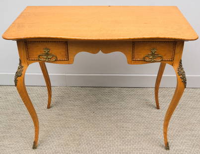 Golden Oak Lady's Writing Desk: 19th century French Provincial golden oak lady's writing desk with ormolu mounted legs and two running pearl framed drawers, 35" X 18 1/2" X 29 1/2".