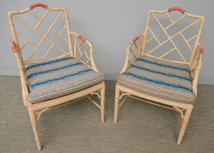 Pair of Faux Bamboo Chinese Chippendale Chairs: Pair of Chinese Chippendale caned seat armchairs, painted white with some red sections, with removable cushions, 23" x 22" x 36 1/2".