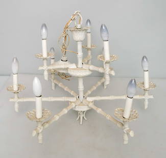 Vintage Chinoiserie Chandelier: Mid-century ceramic and metal faux bamboo chinoiserie chandelier with nine arms, 18" x 25 1/2" x 25 1/2".