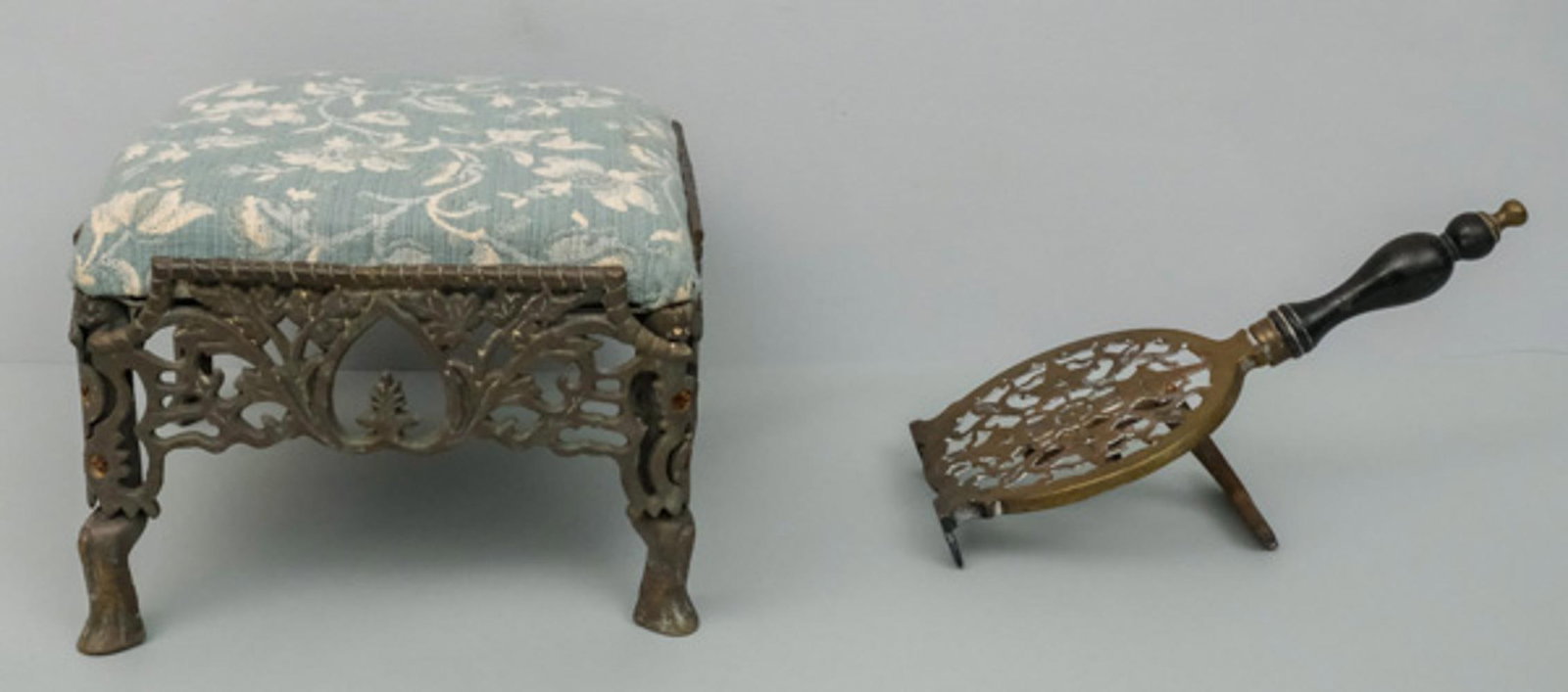 Antique Brass Fire Seat & Bar Trivet: The seat or stool with upholstered drop seat, the trivet with maker's mark. Seat 7 1/4" x 11 1/2".