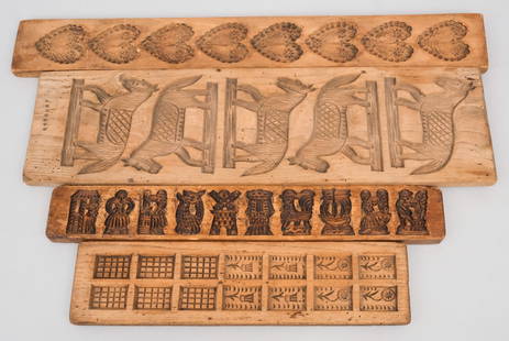 Group of Antique Wooden Cookie or Springerle Molds: Of differing motifs, including hearts and horses. Longest 26 3/4".