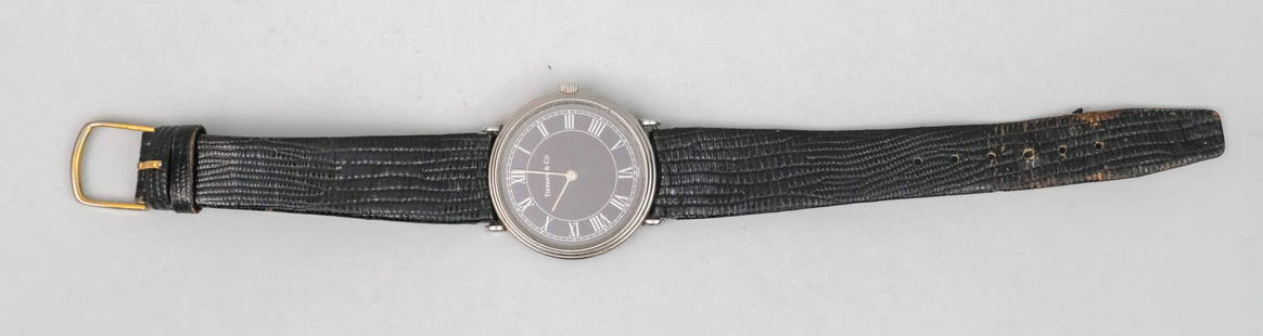 Tiffany Black Face French Wrist Watch: With stylish black leather band, marked as shown, 8