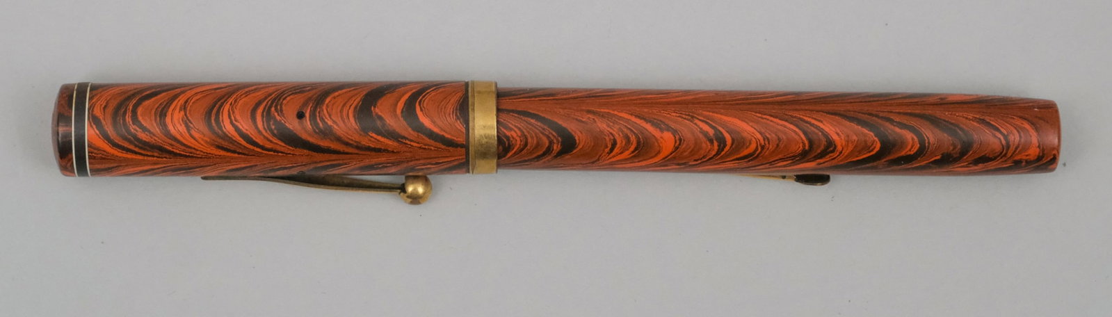 Waterman 7 Red Ripple Fountain Pen: Waterman fountain pen. Marked as shown. 5 5/8".