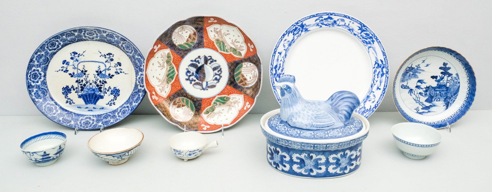 Group of Antique Chinese & Japanese Porcelain: Various forms and palettes. Largest Imari charger 12".