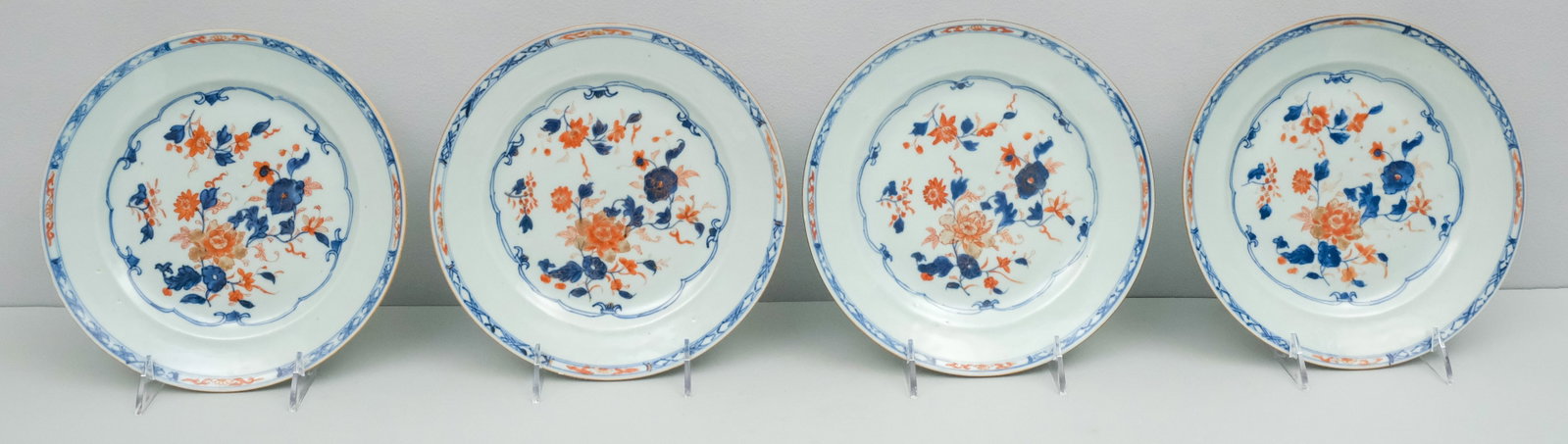 Four Antique Chinese Imari Porcelain Plates: With traditional palette, decorated with florals. 9".
