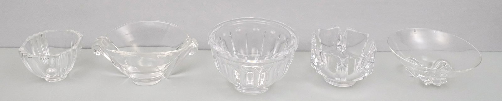Group of 5 Signed Art Glass Bowls: Including examples by Orrefors and Steuben. Marked as shown. Largest 7 7/8" diameter.