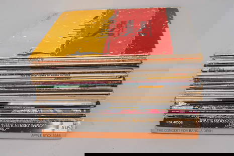 Crate of Various Vinyl Records: Lot consisting of 36 vinyl records and two collections, including Leonard Cohen, Elton John, Bob Marley and the Wailers, Bob Dylan, Woody Guthrie, Michael Jackson, Johnny Cash, Bruce Springsteen, Glor