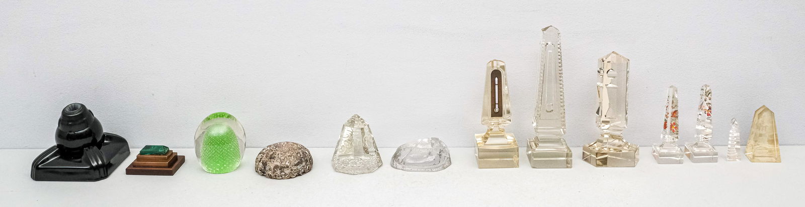 Group of Mixed Antique Glass: Including several desk obelisk, one with thermometer, and a combination cigarette snuffer/ ashtray. Tallest obelisk 7 3/4".