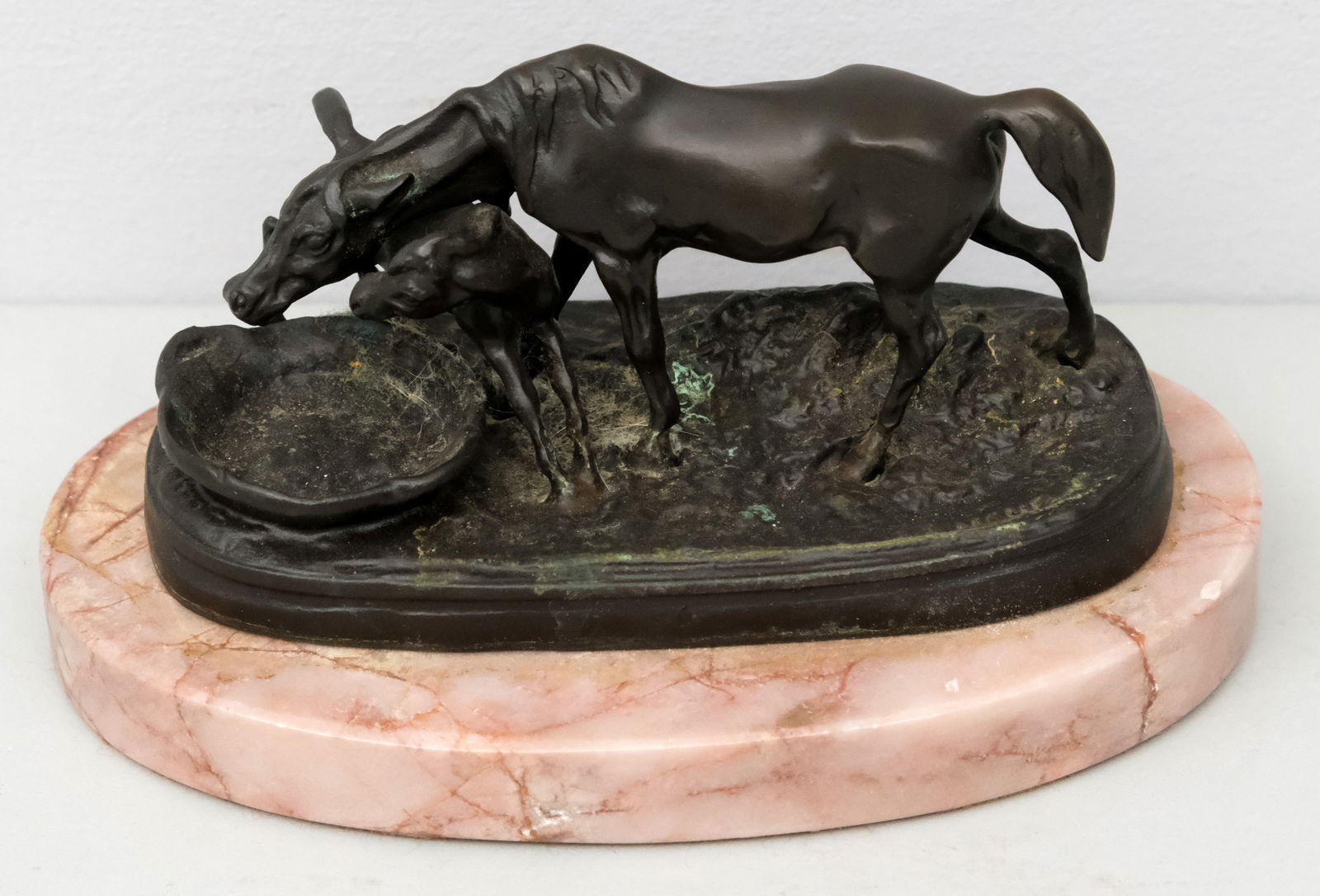 Pierre-Jules Mene, Mare & Foal: Pierre-Jules Mene (French, 1810-1879), bronze sculpture of a mare and her foal, mounted on pink marble, signed toward the front right, 4" x 6 1/2" x 4" overall.