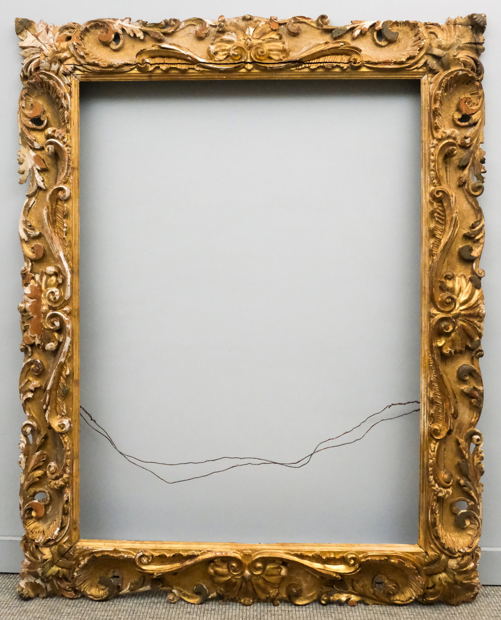 Monumental Italian Giltwood Frame 40" x 54": Italian, possibly Florence, ca. 1840, carved and gilded in the Baroque taste. Overall 54 3/4" x 67 3/4", rabbet 40" x 54", molding 8".