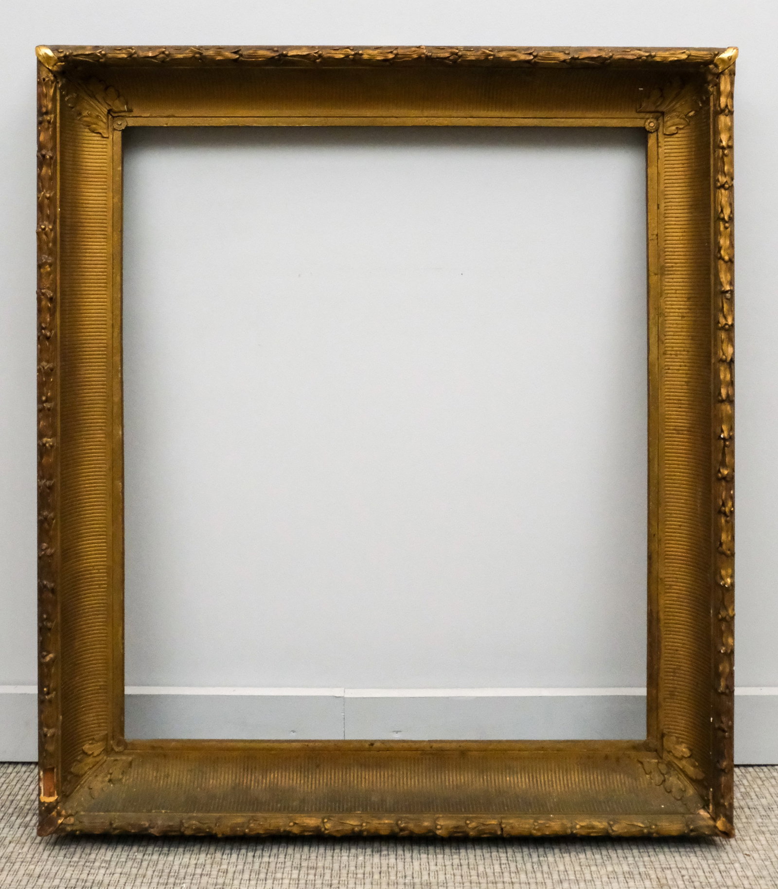 Hudson River School Gilt Frame 28" x 33": American, ca. 1860, having fluted cove and laurel and berry top edge. Overall 36 1/4" x 41 1/4", rabbet 28" x 33", molding 4 1/4".